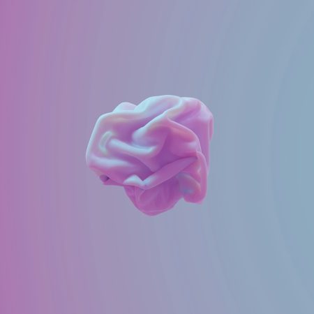 a close up of a pink object in the air