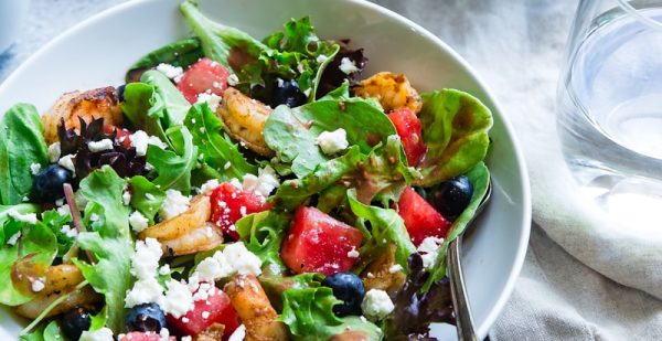 vegetable salad on white ceramic bowl