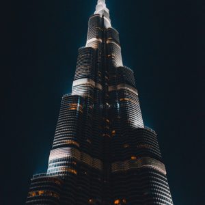 black and gray concrete building low angle photography